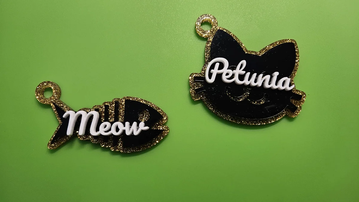Gold glitter cat and fishbone name charms